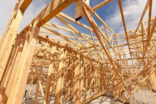 Wooden house framing under construction